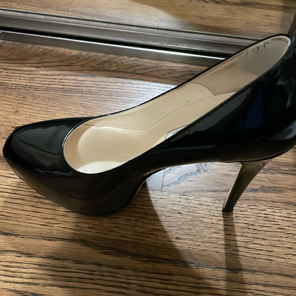 Brian Atwood black 120MM pumps. Worn twice and heel has protected sole affixed.